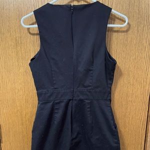 Black fitted dress with pockets